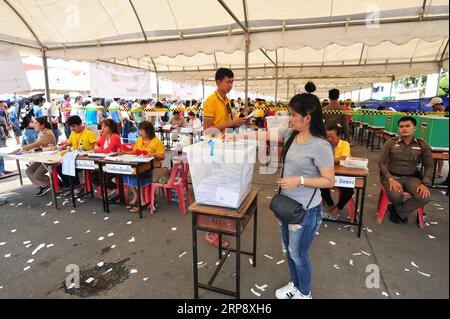 (190317) -- BANGKOK, March 17, 2019 -- People vote at a polling station in Samut Prakan province, on the outskirts of Bangkok, Thailand, March 17, 2019. An average of 75 percent voter turnout was reported in Sunday s early voting for the general election in Thailand, a senior official of the Election Commission said. ) THAILAND-BANGKOK-GENERAL ELECTION-EARLY VOTING RachenxSageamsak PUBLICATIONxNOTxINxCHN Stock Photo