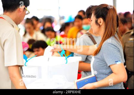 (190317) -- BANGKOK, March 17, 2019 -- People vote at a polling station in Samut Prakan province, on the outskirts of Bangkok, Thailand, March 17, 2019. An average of 75 percent voter turnout was reported in Sunday s early voting for the general election in Thailand, a senior official of the Election Commission said. ) THAILAND-BANGKOK-GENERAL ELECTION-EARLY VOTING RachenxSageamsak PUBLICATIONxNOTxINxCHN Stock Photo