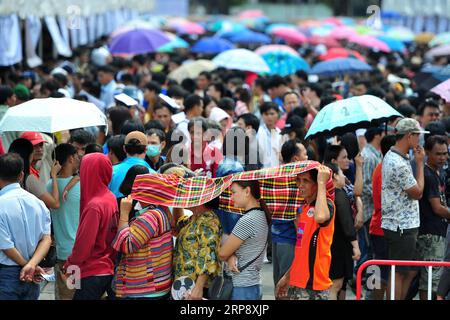 (190317) -- BANGKOK, March 17, 2019 -- People queue to vote at a polling station in Samut Prakan province, on the outskirts of Bangkok, Thailand, March 17, 2019. An average of 75 percent voter turnout was reported in Sunday s early voting for the general election in Thailand, a senior official of the Election Commission said. ) THAILAND-BANGKOK-GENERAL ELECTION-EARLY VOTING RachenxSageamsak PUBLICATIONxNOTxINxCHN Stock Photo