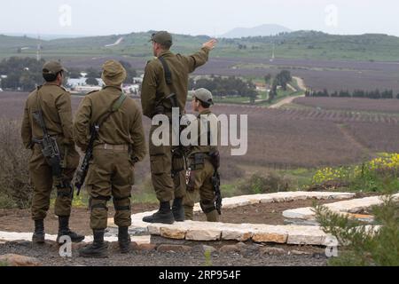 (190324) -- GOLAN HEIGHTS, March 24, 2019 -- Israeli soldiers prepare at the Quneitra crossing of the Israeli-occupied Golan Heights, on March 23, 2019, as demonstrations are expected on the Syrian side to protest against the recent remarks by U.S. President Donald Trump about Israel s sovereignty over the Israeli-occupied Golan Heights. /Ayal Margolin) MIDEAST-GOLAN HEIGHTS-IDF-ALERT JINI PUBLICATIONxNOTxINxCHN Stock Photo
