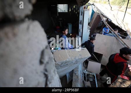 (190326) -- GAZA, March 26, 2019 -- Palestinians inspect the Omer Bin Abdul Aziz Mosque after it was damaged in an Israeli air strike, in the northern Gaza Strip town of Beit Hanoun, March 26, 2019. Tension between the Israeli army and Hamas movement and other military groups in the Gaza Strip continued on Tuesday for the second day. Israeli helicopters and army artillery bombed military facilities in the Gaza Strip on predawn Tuesday, Palestinian security sources and the pro-Hamas local radio station of al-Aqsa reported. Yasser Qudih) MIDEAST-GAZA-AIR STRIKE ZhaoxYue PUBLICATIONxNOTxINxCHN Stock Photo