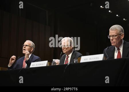 (190327) -- WASHINGTON, March 27, 2019 (Xinhua) -- Daniel Elwell (L), acting administrator of the U.S. Federal Aviation Administration (FAA), Robert Sumwalt (C), Chairman of the U.S. National Transportation Safety Board (NTSB), and Calvin Scovel, the U.S. Transportation Department s inspector general, attend a Senate Commerce Committee hearing on airline safety in Washington D.C., the United States, on March 27, 2019. The U.S. Federal Aviation Administration (FAA) on Wednesday vowed to revamp its air safety oversight after two deadly crashes involving Boeing 737 Max jets in less than five mont Stock Photo