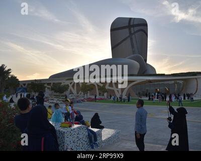 (190330) -- KHOBAR, March 30, 2019 (Xinhua) -- Visitors take pictures outisde the King Abdulaziz Center for World Culture (Ithra), one of the organizers of Sharqiah Season, in Dhahran in Eastern Province of Saudi Arabia, March 29, 2019. The Sharqiah Season, held in nine cities in Eastern Province, wrapped up on March 30. Over the period of 17 days, the season entailed a carefully crafted selection of over 100 programs and activities covering culture, sports, education and entertainment. (Xinhua/Tu Yifan) SAUDI ARABIA-EASTERN PROVINCE-SHARQIAH SEASON PUBLICATIONxNOTxINxCHN Stock Photo