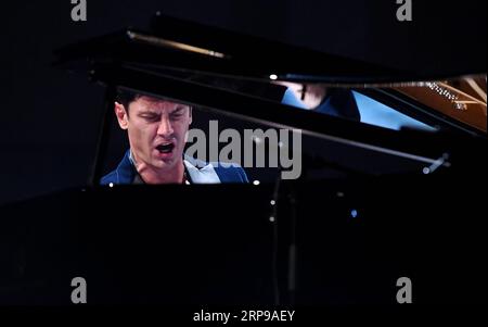 (190331) -- ZAGREB, March 31, 2019 -- Croatian pianist Maksim Mrvica performs during a concert in the Vatroslav Lisinski Concert Hall in Zagreb, Croatia, March 30, 2019. ) CROATIA-ZAGREB-MUSIC-MAKSIM MRVICA MarkoxLukunic PUBLICATIONxNOTxINxCHN Stock Photo