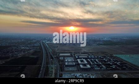 (190403) -- BEIJING, April 3, 2019 (Xinhua) -- Aerial photo taken on March 31, 2019 shows the Xiong an citizen service center in Xiong an New Area, north China s Hebei Province. On April 1, 2017, China announced plans to establish the Xiong an New Area, about 100 kilometers southwest of Beijing. Known as China s city of the future , Xiong an has been designed to become a zone for innovation, a digital city synchronized with a brick-and-mortar one, and a livable and business-friendly area. (Xinhua/Mu Yu) XINHUA PHOTOS OF THE DAY PUBLICATIONxNOTxINxCHN Stock Photo