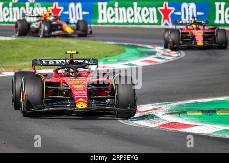 Monza, Italy. 03rd Sep, 2023. Scuderia Ferrari's Spanish driver Carlos Sainz (front), Scuderia Ferrari's Monegasque driver Charles Leclerc (R) and Oracle Red Bull Racing's Mexican driver Sergio Perez compete during the Italian F1 Grand Prix race at the Autodromo Nazionale Monza. Credit: SOPA Images Limited/Alamy Live News Stock Photo