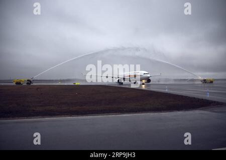 (190409) -- VANTAA, April 9, 2019 (Xinhua) -- Tibet Airlines inaugural flight from Jinan, the capital city of eastern China s Shandong Province, lands at the Helsinki-Vantaa International Airport in Finland, April 8, 2019. An Airbus 330 operated by China Tibet Airlines landed at the Helsinki-Vantaa International Airport late on Monday, opening the weekly direct flights between Jinan, Shandong Province of China and Helsinki, capital of Finland. Tibet Airlines has one flight to Finland every week in April and will possibly run two weekly flights in June. (Xinhua/Finavia) FINLAND-VANTAA-TIBET AIR Stock Photo