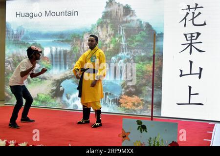 (190412) -- DHAKA, April 12, 2019 -- Contestants perform during the Chinese Bridge Chinese proficiency competition in Dhaka, Bangladesh, April 11, 2019. A Chinese Proficiency Competition was held Thursday in Bangladeshi capital Dhaka. The competition featured diverse performances including speeches, dancing, martial arts and contemporary music. ) BANGLADESH-DHAKA-CHINESE PROFICIENCY COMPETITION SalimxReza PUBLICATIONxNOTxINxCHN Stock Photo