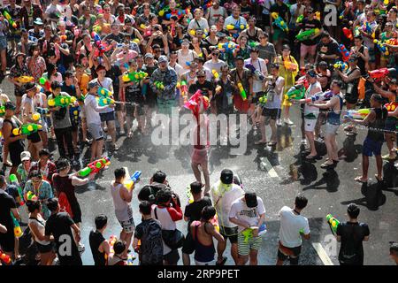 (190414) -- BEIJING, April 14, 2019 (Xinhua) -- People attend the water fight to celebrate the Songkran Festival on Silom Road in Bangkok, Thailand, April 13, 2019. Songkran Festival, also known as water festival, is celebrated in Thailand on April 13. (Xinhua/Zhang Keren) XINHUA PHOTOS OF THE DAY PUBLICATIONxNOTxINxCHN Stock Photo