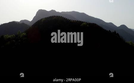 (190420) -- TIANJIN, April 20, 2019 (Xinhua) -- Photo taken on April 19, 2019 shows the Huangyaguan Great Wall in the northern suburb of Tianjin, north China. The Huangyaguan Great Wall was built more than 14 centuries ago for border defense purpose. The structure winds its way for about 3,000 meters along the mountain areas of today s Jizhou District on the outskirts of Tianjin. (Xinhua/Yue Yuewei) CHINA-TIANJIN-HUANGYAGUAN GREAT WALL (CN) PUBLICATIONxNOTxINxCHN Stock Photo