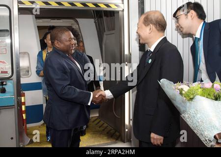 (190423) -- BEIJING, April 23, 2019 (Xinhua) -- Mozambican President Filipe Nyusi (L) arrives in Beijing, capital of China, April 23, 2019, to attend the second Belt and Road Forum for International Cooperation (BRF). (Xinhua/Ju Huanzong) CHINA-BEIJING-BELT AND ROAD FORUM-MOZAMBICAN PRESIDENT-ARRIVAL (CN) PUBLICATIONxNOTxINxCHN Stock Photo