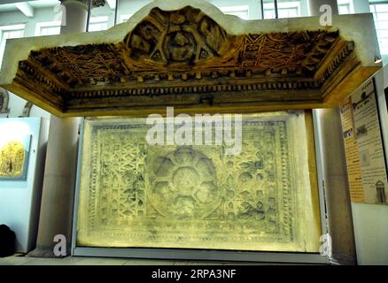 (190424) -- SYRIA, April 24, 2019 -- A 3D-printed ceiling of a worship area of the Bel Temple of Palmyra is showcased in the Damascus National Museum in Damascus, Syria, on April 23, 2019. Italian artists replicated the part of the ceiling that was produced as a gift to the national museum. The original part of the ceiling was destroyed along with the entire Bel Temple by the Islamic State (IS) group during its invasion of the ancient oasis city of Palmyra in 2014. ) SYRIA-DAMASCUS-ARCHEOLOGY-CEILING AmmarxSafarjalani PUBLICATIONxNOTxINxCHN Stock Photo