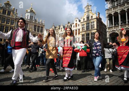 (190428) -- BRUSSELS, April 28, 2019 -- Tourists and performers dance on the last day of the 2019 Balkan Trafik at the Grand Place in Brussels, Belgium, April 28, 2019. The festival aims to share the artistic and festive cultures of the Balkans in south-eastern Europe. ) BELGIUM-BRUSSELS-BALKAN TRAFIK ZhengxHuansong PUBLICATIONxNOTxINxCHN Stock Photo