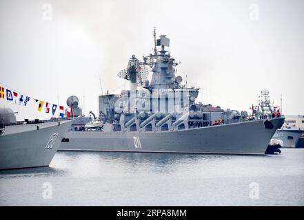 (190429) -- QINGDAO, April 29, 2019 (Xinhua) -- Russian cruiser Varyag (C) arrives at Dagang port of Qingdao, east China s Shandong Province, April 29, 2019. Russian naval vessels arrived in Qingdao on Monday to participate in the Sino-Russian Joint Sea-2019 exercise. The exercise will focus on joint sea defense, which aims to consolidate and develop the China-Russia comprehensive strategic partnership of coordination, deepen pragmatic naval cooperation, and improve their capabilities to jointly respond to security threats at sea. Two submarines, 13 surface ships, as well as fixed-wing airplan Stock Photo