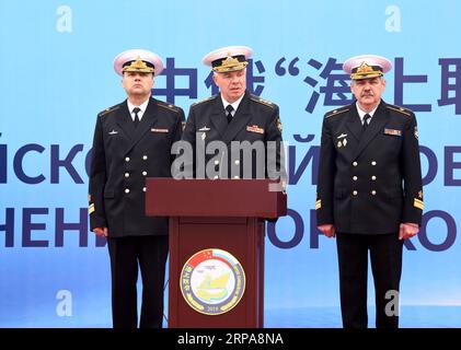 (190429) -- QINGDAO, April 29, 2019 (Xinhua) -- Alexander Vitko (C), chief director of Joint Sea-2019 exercise from the Russian side and deputy commander-in-chief of the Russian Navy, delivers a speech at the welcome ceremony for Russian navy vessels in Qingdao, east China s Shandong Province, April 29, 2019. Russian naval vessels arrived in Qingdao on Monday to participate in the Sino-Russian Joint Sea-2019 exercise. The exercise will focus on joint sea defense, which aims to consolidate and develop the China-Russia comprehensive strategic partnership of coordination, deepen pragmatic naval c Stock Photo