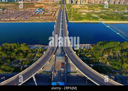 (190513) -- BEIJING, May 13, 2019 (Xinhua) -- Aerial photo taken on May 17, 2017 shows a view of Datong City, north China s Shanxi Province. The Shanxi Day theme event held as part of the Beijing International Horticultural Exhibition kicked off in Beijing on May 12. The Shanxi Garden showcases its endeavor in greening and afforestation as well as its concept of green development at the ongoing expo. No longer mainly relying on its coal industry for growth, Shanxi has been committed to developing clean energy and other emerging industries to strike a balance between environment protection and Stock Photo