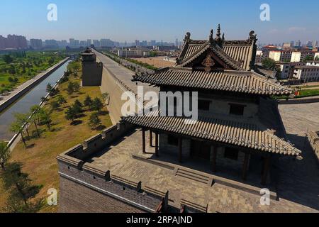 (190513) -- BEIJING, May 13, 2019 (Xinhua) -- Aerial photo taken on May 18, 2017 shows a view of Datong City, north China s Shanxi Province. The Shanxi Day theme event held as part of the Beijing International Horticultural Exhibition kicked off in Beijing on May 12. The Shanxi Garden showcases its endeavor in greening and afforestation as well as its concept of green development at the ongoing expo. No longer mainly relying on its coal industry for growth, Shanxi has been committed to developing clean energy and other emerging industries to strike a balance between environment protection and Stock Photo