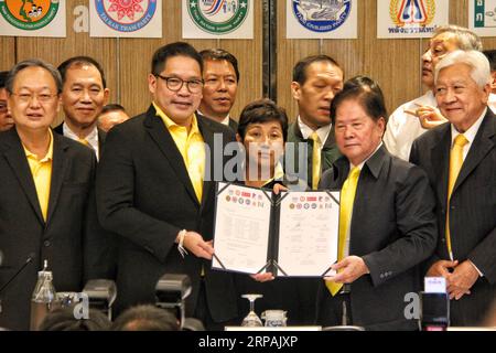 (190513) -- BANGKOK, May 13, 2019 (Xinhua) -- Samphan Lertnuwat(2nd R, front), leader of Thai Citizen Power Party, gives the 11 one-seat parties statement of supporting Prayut Chan-o-cha to be elected as new prime minister to Uttama Savanayana (2nd L, front), leader of pro-Prayut Palang Pracharath party, after a press conference held in Bangkok, Thailand, May 13, 2019. Eleven Thai political parties which won one seat each in Thailand s March 24 elections said on Monday that they would vote for incumbent Prime Minister Prayut Chan-o-cha to be elected as new prime minister. (Xinhua/Yang Zhou) TH Stock Photo