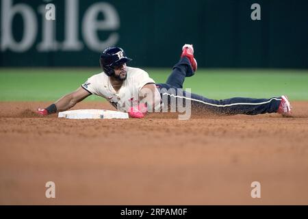 Texas Rangers Leody Taveras steals second base against the Minnesota Twins  during the fifth inning of a baseball game, Saturday, Aug. 26, 2023, in  Minneapolis. (AP Photo/Craig Lassig Stock Photo - Alamy