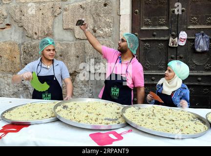 (190516) -- DAMASCUS, May 16, 2019 -- Volunteers prepare food