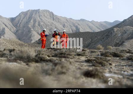 (190516) -- RUOQIANG, May 16, 2019 (Xinhua) -- Technicians work on Altun Mountains in Ruoqiang County, northwest China s Xinjiang Uygur Autonomous Region, May 15, 2019. The 13.195-kilometer-long tunnel through Altun Mountains is the longest tunnel of the Golmud-Korla railway line. The railway line, connecting Golmud in Qinghai and Korla in Xinjiang, is the third rail artery linking Xinjiang with neighboring provinces. The line will cut the traffic time between Golmud and Korla from 26 hours to 12 hours. (Xinhua/Ding Lei) CHINA-XINJIANG-RAILWAY-TUNNEL-CONSTRUCTION (CN) PUBLICATIONxNOTxINxCHN Stock Photo