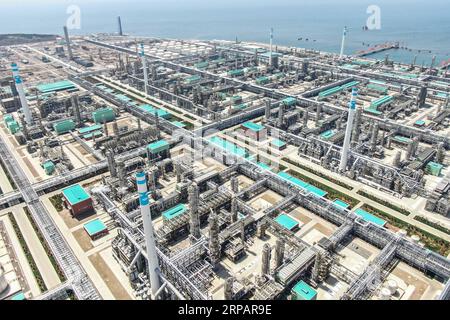 (190518) -- DALIAN, May 18, 2019 (Xinhua) -- Aerial photo taken on May 17, 2019 shows the industrial park of the Hengli Petrochemical (Dalian) Refining Co., Ltd. on the Changxing Island in Dalian City, northeast China s Liaoning Province. The private-owned Hengli Petrochemical (Dalian) Refining Co., Ltd. achieved full operation in its 20 million tonnes per year refinery and chemical complex in Dalian, the company said Friday. (Xinhua/Pan Yulong) CHINA-LIAONING-DALIAN-HENGLI PETCHAM-FULL OPERATION (CN) PUBLICATIONxNOTxINxCHN Stock Photo