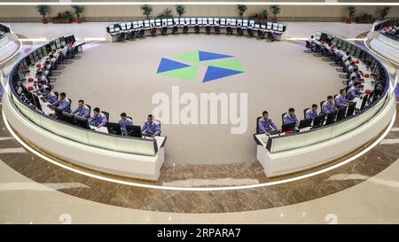 (190518) -- DALIAN, May 18, 2019 (Xinhua) -- Staff members of the Hengli Petrochemical (Dalian) Refining Co., Ltd. monitor the operation of equipments on the Changxing Island in Dalian City, northeast China s Liaoning Province, May 17, 2019. The private-owned Hengli Petrochemical (Dalian) Refining Co., Ltd. achieved full operation in its 20 million tonnes per year refinery and chemical complex in Dalian, the company said Friday. (Xinhua/Pan Yulong) CHINA-LIAONING-DALIAN-HENGLI PETCHAM-FULL OPERATION (CN) PUBLICATIONxNOTxINxCHN Stock Photo