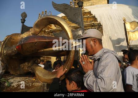 (190518) -- KATHMANDU, May 18, 2019 -- People offer prayers during the celebration of Buddha Jayanti Festival at Swayambhunath in Kathmandu, capital of Nepal, on May 18, 2019. The Buddha Jayanti festival is celebrated as a holy day by Buddhists in many Asian countries to mark the birth, enlightenment and Nirvana of Gautam Buddha. ) NEPAL-KATHMANDU-BUDDHA JAYANTI FESTIVAL SunilxSharma PUBLICATIONxNOTxINxCHN Stock Photo
