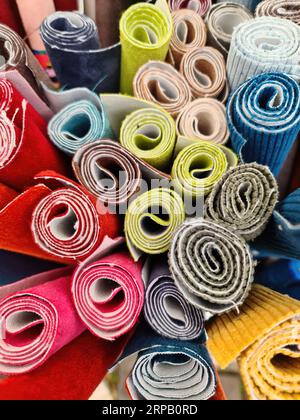 Close Up View On Samples Of Cloth And Fabrics In Different Colors Stock Photo