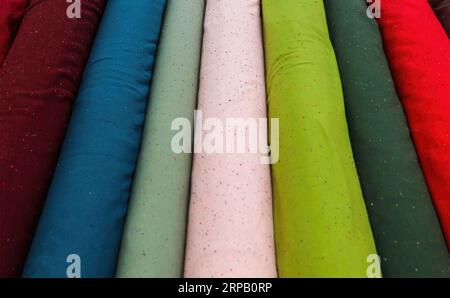 Close Up View On Samples Of Cloth And Fabrics In Different Colors Stock Photo