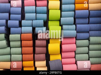 Close Up View On Samples Of Cloth And Fabrics In Different Colors Stock Photo