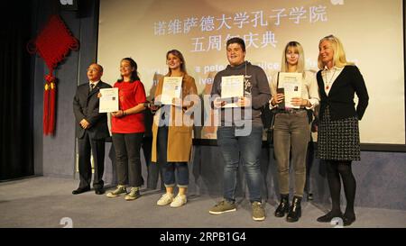 (190524) -- NOVI SAD (SERBIA), May 24, 2019 -- Students hold their diplomas of the Chinese Proficiency Test, also known as HSK, during a ceremony marking the fifth anniversary of the Confucius Institute at the University of Novi Sad, in Novi Sad, Serbia, on May 24, 2019. Students of the Confucius Institute at the University of Novi Sad demonstrated their language skills and arts at a ceremony marking the fifth anniversary of the institute on Friday. ) SERBIA-NOVI SAD-CONFUCIUS INSTITUTE-ANNIVERSARY NemanjaxCabric PUBLICATIONxNOTxINxCHN Stock Photo