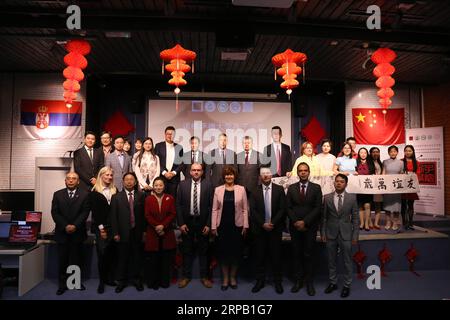 (190524) -- NOVI SAD (SERBIA), May 24, 2019 (Xinhua) -- Guests pose for a group photo during a ceremony marking the fifth anniversary of the Confucius Institute at the University of Novi Sad, in Novi Sad, Serbia, on May 24, 2019. Students of the Confucius Institute at the University of Novi Sad demonstrated their language skills and arts at a ceremony marking the fifth anniversary of the institute on Friday. (Xinhua/Shi Zhongyu) SERBIA-NOVI SAD-CONFUCIUS INSTITUTE-ANNIVERSARY PUBLICATIONxNOTxINxCHN Stock Photo