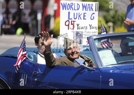 (190527) -- NEW YORK, May 27, 2019 -- Luke Gasparre, a 95-year-old World War II veteran, takes part in the Memorial Day Parade in Queens of New York, the United States, May 27, 2019. The Memorial Day is a United States federal holiday observed on the last Monday of May. ) U.S.-NEW YORK-MEMORIAL DAY PARADE WangxYing PUBLICATIONxNOTxINxCHN Stock Photo