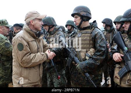 (190529) -- SLUNJ (CROATIA), May 29, 2019 -- Croatian Defence Minister Damir Krsticevic (L, front) meets with soldiers during the military exercise Immediate Response 2019 to mark the 10th anniversary of Croatia s NATO membership in Slunj, Croatia, May 29, 2019. ) CROATIA-SLUNJ-MILITARY EXERCISE KristinaxStedulxFabac PUBLICATIONxNOTxINxCHN Stock Photo