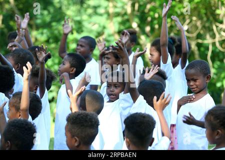 (190603) -- PAMPANGA PROVINCE, June 3, 2019 -- Children from the indigenous group Aeta attend class during the first day of classes in temporary classrooms of Diaz Elementary school in Pampanga Province, the Philippines, June 3, 2019. Temporary classrooms were set up after the Aeta community s classrooms were destroyed by the earthquake last April, as today marks the first day of new school year in the Philippines. ) PHILIPPINES-PAMPANGA PROVINCE-FIRST DAY OF SCHOOL ROUELLExUMALI PUBLICATIONxNOTxINxCHN Stock Photo