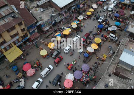 (190603) -- SRINAGAR, June 3, 2019 (Xinhua) -- Aerial photo taken on June 3, 2019 shows people shopping at a market in preparation of Eid al-Fitr festival in Aanatnag town, about 55 km south of Srinagar city, the summer capital of Indian-controlled Kashmir. (Xinhua/Javed Dar) KASHMIR-SRINAGAR-EID AL-FITR-PREPARATION PUBLICATIONxNOTxINxCHN Stock Photo