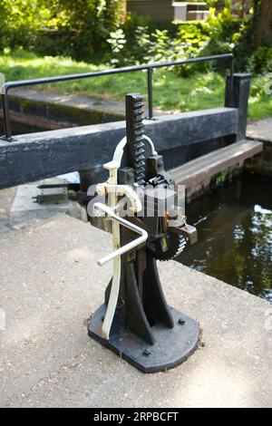 Detail of West Retford lock on the Chesterfield Canal. It is bad practice to leave the windlass in place as it can spin off and injure you Stock Photo