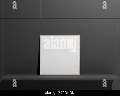 Hanging empty blank frame leaning against the wall Stock Photo