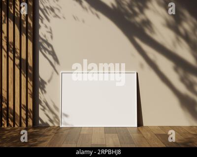 Frame mockup on wooden floor with white wall and leaves shadow Stock Photo
