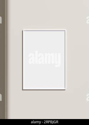 Thin rectangular frame hanging on a white textured wall mockup. Stock Photo