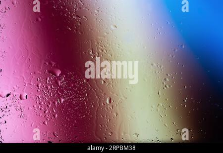 Water drops on a glass surface close up Stock Photo