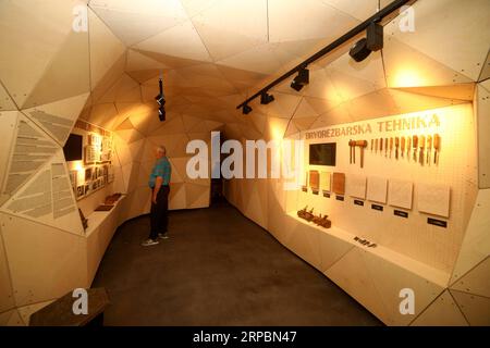 (190612) -- KONJIC, June 12, 2019 -- A man visits the Museum of Woodcarving in Konjic, Bosnia and Herzegovina, on June 12, 2019. A Museum focusing on the history of woodcarving was opened on Wednesday in Konjic, a city about 60 kilometers southwest from the capital Sarajevo. The Konjic woodcarving craft was inscribed on the UNESCO s Representative List of the Intangible Cultural Heritage of Humanity in 2017. ) BOSNIA AND HERZEGOVINA-KONJIC-WOODCARVING MUSEUM NedimxGrabovica PUBLICATIONxNOTxINxCHN Stock Photo