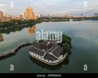 (190617) -- BEIJING, June 17, 2019 (Xinhua) -- Aerial photo taken on May 17, 2016 shows the Yanshui Pavilion in Jiujiang City, east China s Jiangxi Province. Jiangxi Province is located in eastern China along the southern shore of Yangtze River with abundant resources and mild climate. Surrounded by majestic mountains, the province is also known for the Poyang Lake, China s largest freshwater lake. Jiangxi has made great efforts in ecological development and building national ecological civilization pilot zone. On June 16-18, the Beijing International Horticultural Exhibition displays Jiangxi Stock Photo