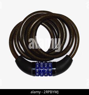 Cable lock for bicycle and motorcycle. Stock Photo