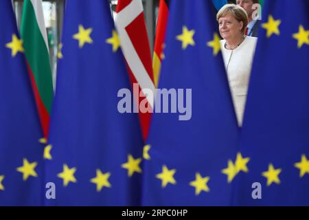 (190620) -- BRUSSELS, June 20, 2019 (Xinhua) -- German Chancellor Angela Merkel arrives for the EU summer summit in Brussels, Belgium, June 20, 2019. (Xinhua/Zhang Cheng) BELGIUM-BRUSSELS-EU-SUMMER SUMMIT PUBLICATIONxNOTxINxCHN Stock Photo