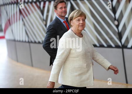 (190620) -- BRUSSELS, June 20, 2019 (Xinhua) -- German Chancellor Angela Merkel arrives for the EU summer summit in Brussels, Belgium, June 20, 2019. (Xinhua/Zhang Cheng) BELGIUM-BRUSSELS-EU-SUMMER SUMMIT PUBLICATIONxNOTxINxCHN Stock Photo