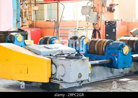 A large iron machine for the manufacture of metal parts, spare parts in the industrial premises of the shop at the oil refinery, chemical plant, enter Stock Photo