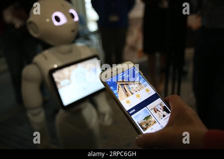 (190625) -- BEIJING, June 25, 2019 (Xinhua) -- A traveller gets access to the application AIA - Toorbee WeChat Miniapp at the Athens International Airport in Athens, Greece, on Dec. 19, 2018. (Xinhua/Marios Lolos) Xinhua Headlines: Europe poised to receive more Chinese tourists PUBLICATIONxNOTxINxCHN Stock Photo