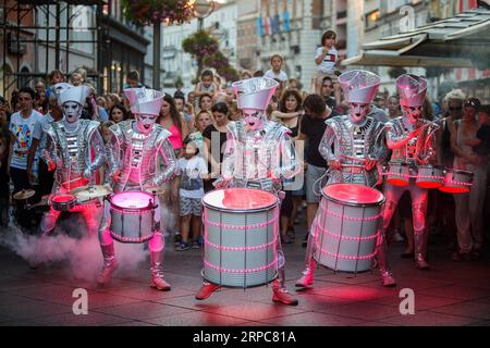 (190627) -- BEIJING, June 27, 2019 -- Drummers perform during the opening ceremony of Tobogan Festival in Rijeka, Croatia, on June 26, 2019. The two-week event featured a series of outdoor performances and activities for children. ) XINHUA PHOTOS OF THE DAY NelxPavletic PUBLICATIONxNOTxINxCHN Stock Photo